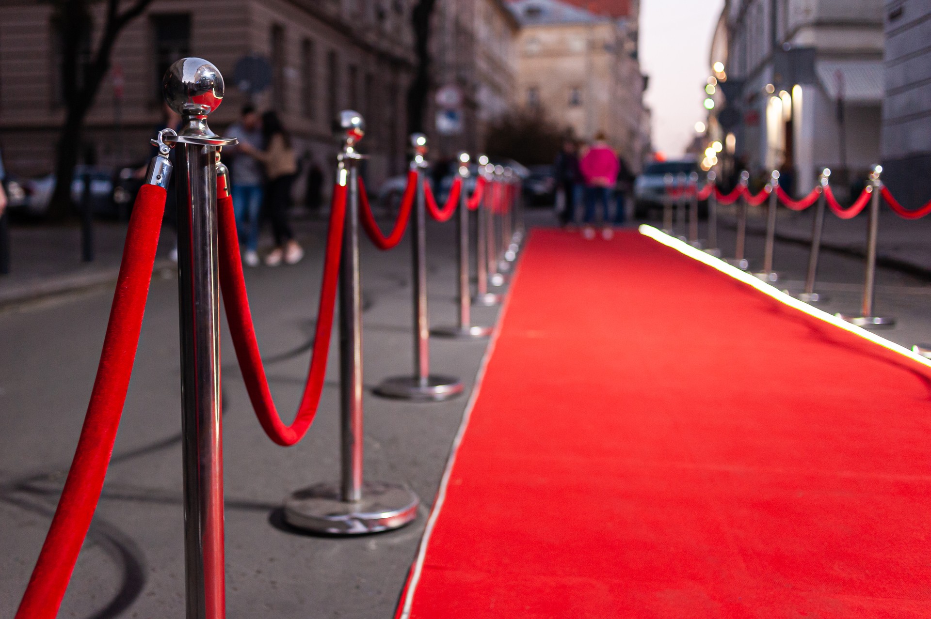 Red Event Carpet, Stair and Gold Rope Barrier Concept of Success and Triumph